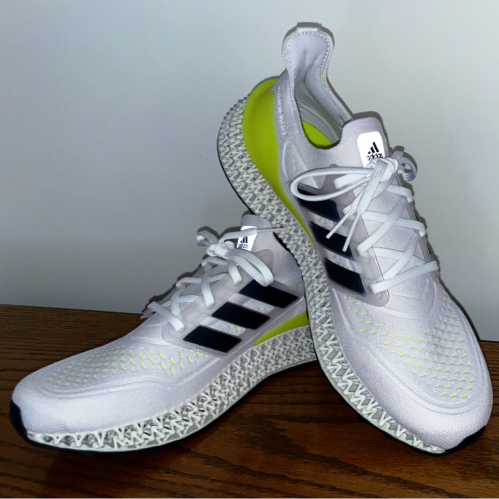 Size 10 white Adidas Ultra 4DFWD. Worn maybe 5 times.